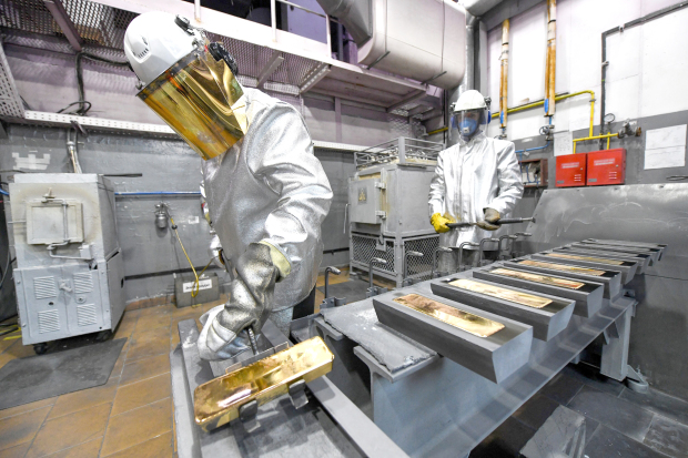 Global stocks fall and gold rises on US tariff uncertainty